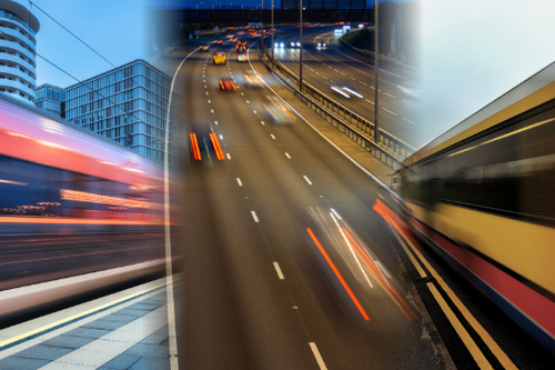 A train, a bus and a motorway.